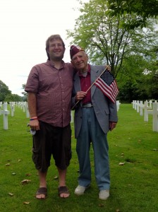 Bernie Rader with grandson Brad Rader at the American Cemetery, June 6, 2014,